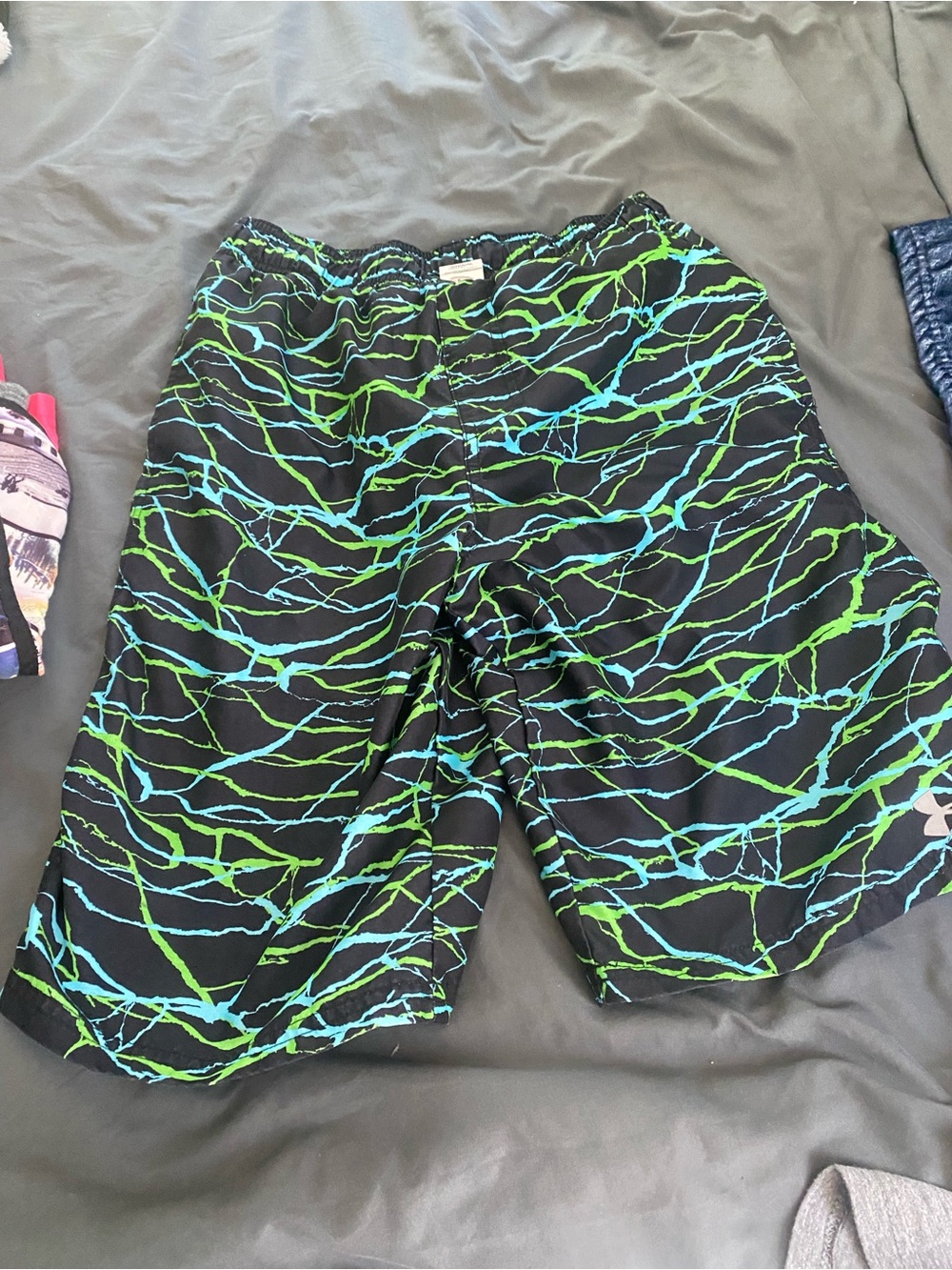 Under Armour Boys Black Swim Trunks with Blue & Green Lightning Print